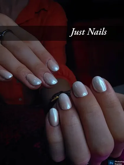 A beautiful, clean look with a pearly white or "glazed donut" finish on short, rounded nails.