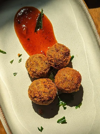 In Kerala, we can make a cutlet out of anything, but my heart belongs to beef cutlets. Crispy on the outside with a tender, flavorful filling, these are a must-try appetizer. I serve them with my special homemade ketchup.