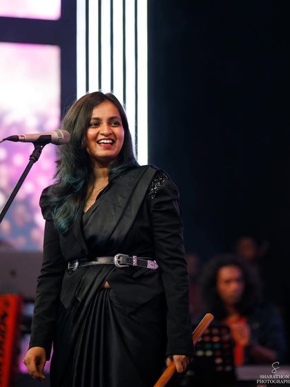 A joyful moment on stage at the Bengaluru Ganesh Utsava. My smile says it all. I feel so much happiness and gratitude when I get to share my music with a live audience.