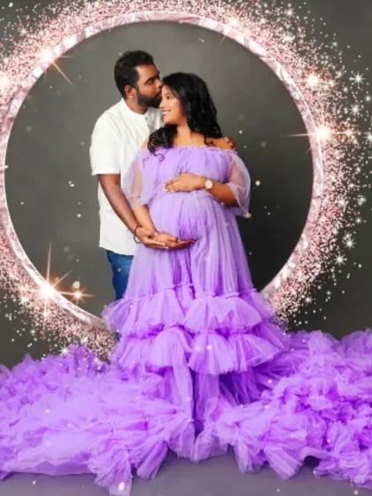 A romantic couple's portrait in our lavender ruffled gown, set against a sparkling, magical backdrop.