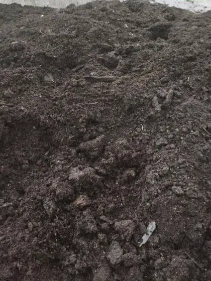 Another look at a pile of our finished compost. We make this available for pickup, though delivery is sometimes a challenge with our equipment issues.