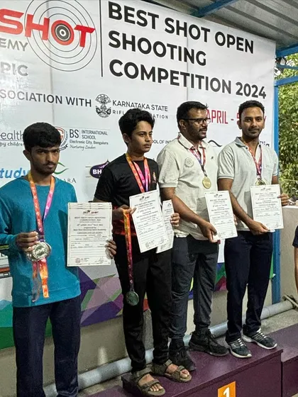Medal winners from the air pistol event at our Best Shot Open Competition, standing proudly on the podium.