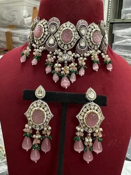 Another view of the pink customizable choker set. This rental piece is perfect for a modern and chic party look.