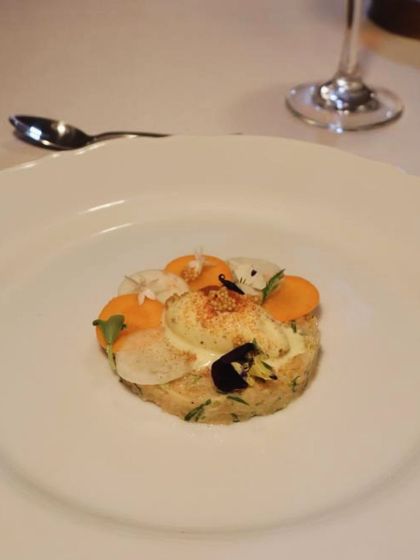 My version of a salmon tartare, served with pickles and a surprising Dijon mustard ice cream. A dish that plays with temperature and expectation.