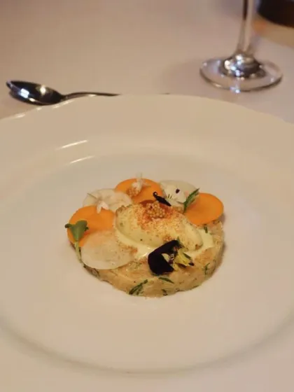 My version of a salmon tartare, served with pickles and a surprising Dijon mustard ice cream. A dish that plays with temperature and expectation.