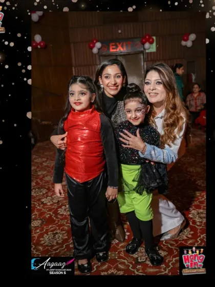 Two of our hula hoop performers with their proud mothers. These moments of celebration after a successful performance are what Aagaaz is all about.