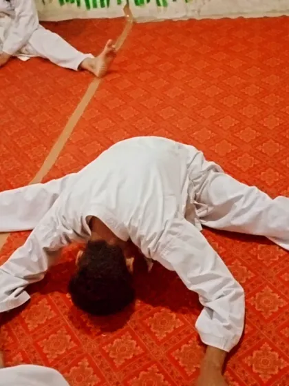 Another student showing excellent flexibility. This is crucial for high kicks and avoiding injury.