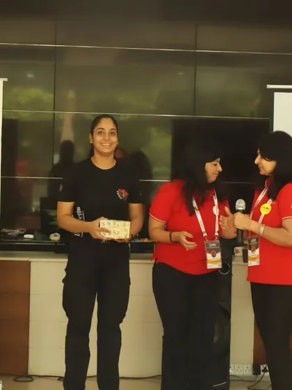 Our lead female instructor, Divya Panwar, being recognized for her work at the ANON event.