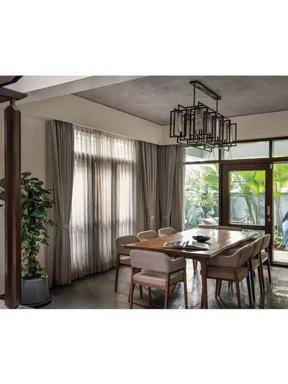 A duplicate view of the Nairy Residence dining room, emphasizing the seamless flow to the outdoor garden, a core principle in my residential designs.