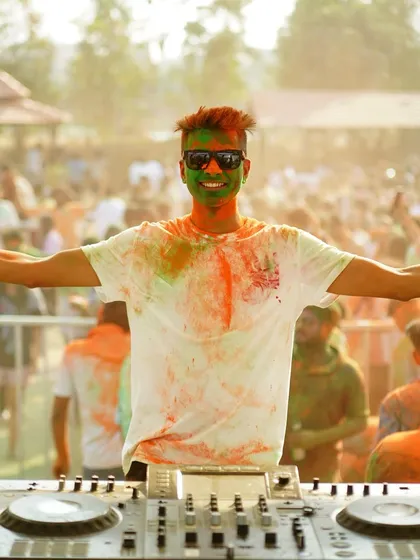 There's no party like a Holi party. Covered in colors, behind the decks, and surrounded by the happiest crowd. I'm ready to make your festive event the most colorful one yet.