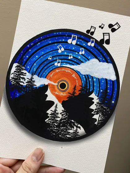 This artwork combines music and nature, with a night forest scene painted onto a vinyl record. The musical notes floating away add a sense of melody and movement to the piece.