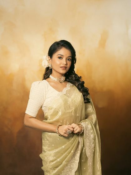 A full-length shot of Sanjana, looking graceful and elegant in the complete retro ensemble.