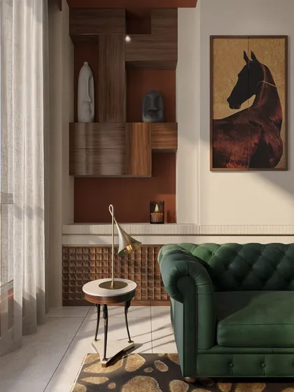 A close-up of the emerald green Chesterfield sofa, paired with a custom shelving unit and a striking piece of equestrian art. The mix of textures and colors creates a rich, layered look.