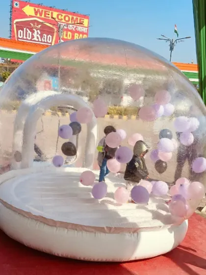 Our transparent bubble house is a huge hit at birthday parties. You can fill it with balloons, as you see here, and it creates a magical play area for kids. It's something different that your guests will definitely remember.