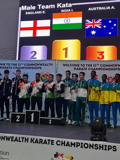 The Indian flag at the center of the podium for the Male Team Kata event at the 11th Commonwealth Karate Championships. A gold medal performance against strong teams from England and Australia.