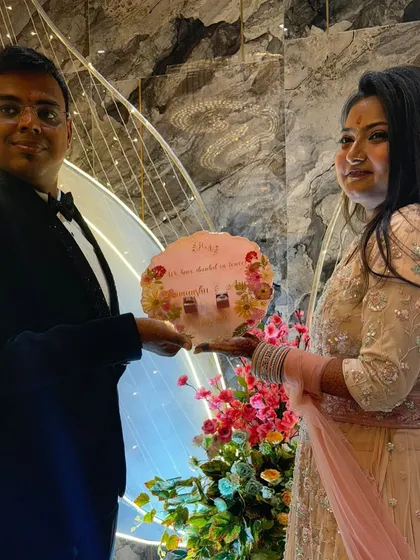 The happy couple with the custom engagement ring platter I made for them. It brings me so much joy to see my work in its new home, celebrating their love.