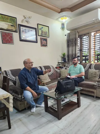 A consultation in progress. I often sit with clients in their space to help them understand the energy dynamics of their own home.
