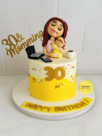 A cake celebrating a supermom turning 30. The handcrafted topper shows her juggling work, coffee, and her baby, a sweet tribute to her daily life.