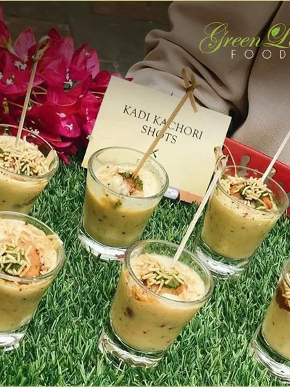 We love giving traditional dishes a modern presentation. These Kadhi Kachori shots feature a crispy kachori dunked in flavorful kadhi, served in a glass for an easy-to-eat, delightful bite.