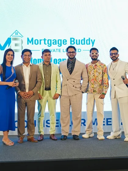 A group photo with the team and special guests at the Mortgage Buddy corporate event. A successful evening of knowledge sharing and networking.