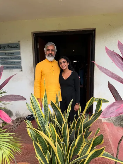 Standing with my guru outside the Yogadhama. Completing my Level 3 training was an intense and transformative journey that taught me the true meaning of self-love through discipline and growth.