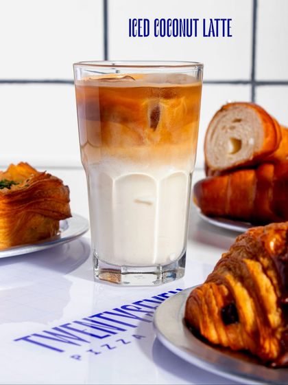 Our Iced Coconut Latte is a tropical twist on a classic, with creamy coconut milk layered with a strong shot of espresso.