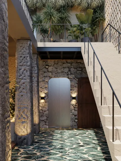 The staircase at Skyro is set against a backdrop of raw stone walls and breeze blocks, with lush greenery cascading from the upper level. The design creates a dramatic transition between the different zones.