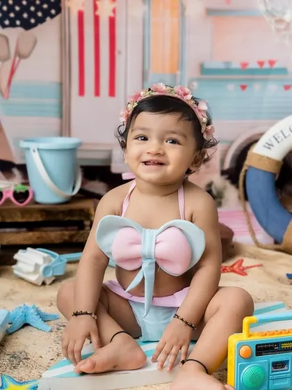 Another joyful smile from this little beachgoer.