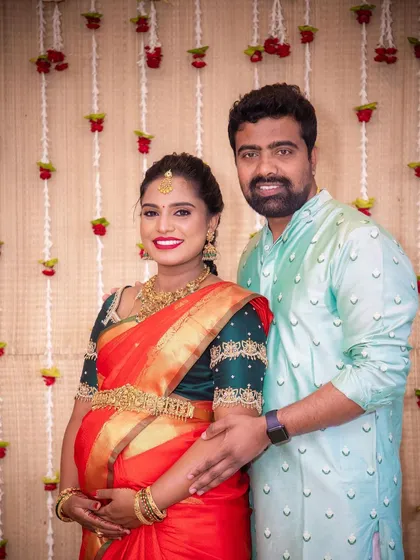A happy portrait of the mom to be with her partner. The makeup is celebratory yet feels natural, ensuring her photos from this day are timeless.