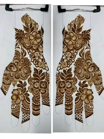 A beautiful mirrored image of a full-coverage floral design, showing how the pattern would look symmetrically on both hands.