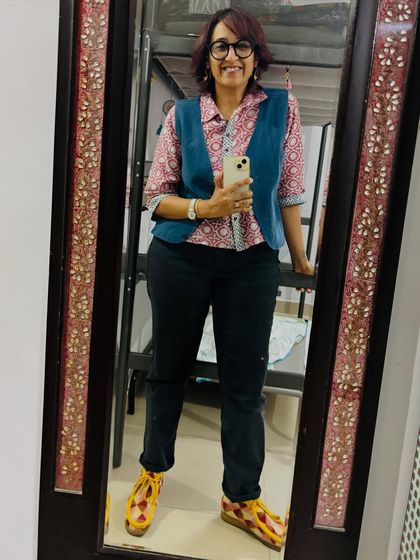 A happy mirror selfie in my Thursday outfit. I love mixing prints and textures, like this block-print kurta and denim waistcoat.