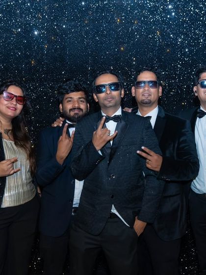 The band, dressed in tuxedos, ready to ring in the new year with great music.