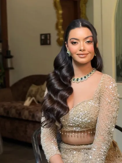 Another look at the deep, structured waves. This is a versatile style that works for brides, bridesmaids, or guests who want a touch of old school glamour for a party.