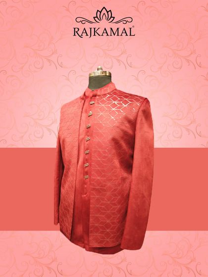 A side view of the vibrant red sherwani, showing its rich color and tailored fit. This is an outfit that guarantees you will be the center of attention.
