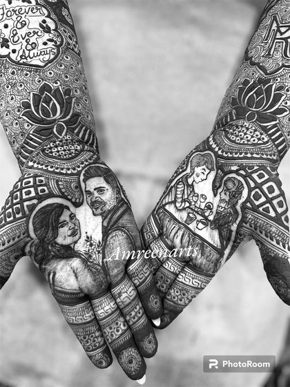 The timeless beauty of a portrait design, captured in black and white. This view highlights the intricate line work and shading that goes into each figure.