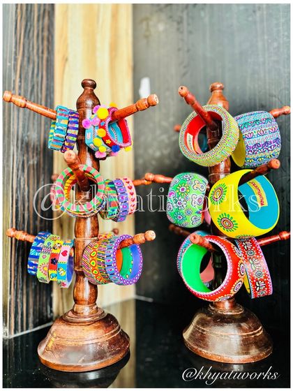 My bangle stands are always overflowing with color. You can see a mix of my wide, hand-painted bangles and the quirky, beaded Abacus bangles.