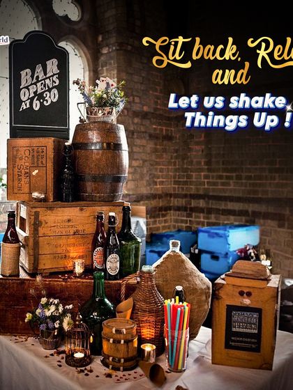 This setup features vintage crates, barrels, and antique-style bottles to create a rustic, old-world charm. It's perfect for themed parties or events that require a touch of historical character.