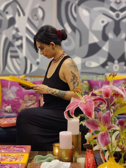 The artist in her element, working on a series of small, abstract pieces in the studio.