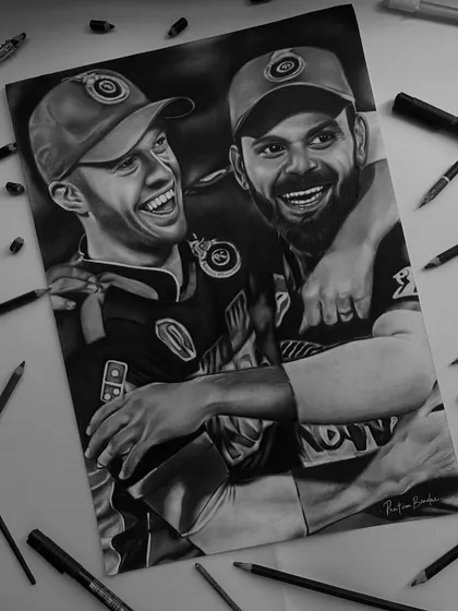A tribute to a legendary cricketing friendship. This charcoal drawing of Virat Kohli and AB de Villiers captures a moment of pure joy and camaraderie that every fan cherishes.
