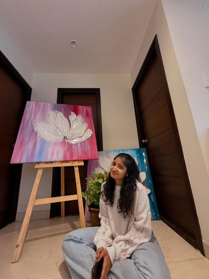 This is the fifth painting of my six-part series, "The Becoming." Pictured here with another piece from the collection, you can see how the theme of blossoming evolves through different color palettes and emotions.