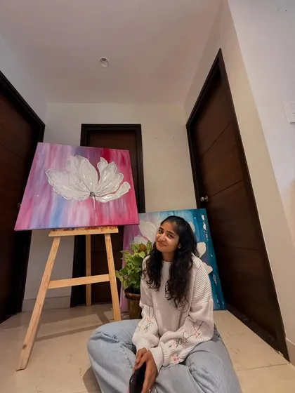 This is the fifth painting of my six-part series, "The Becoming." Pictured here with another piece from the collection, you can see how the theme of blossoming evolves through different color palettes and emotions.