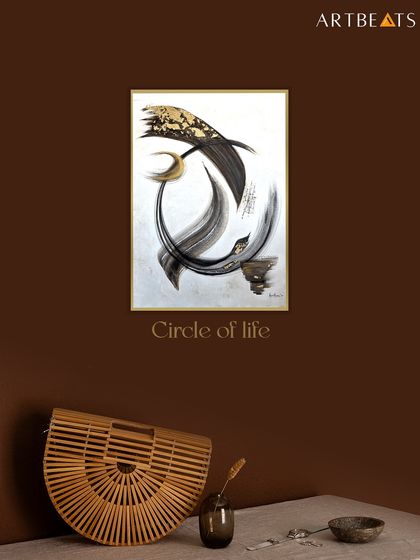 Here, the 'Circle of Life' painting is shown against a rich, warm wall. The minimalist, calligraphic strokes in black and gold create a focal point that is both dramatic and meditative, exploring themes of continuity and connection.