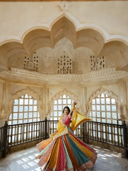 The bride's joyful twirl fills this ornate chamber with energy and color. I love using these architectural details to frame solo portraits that are full of life and personality.