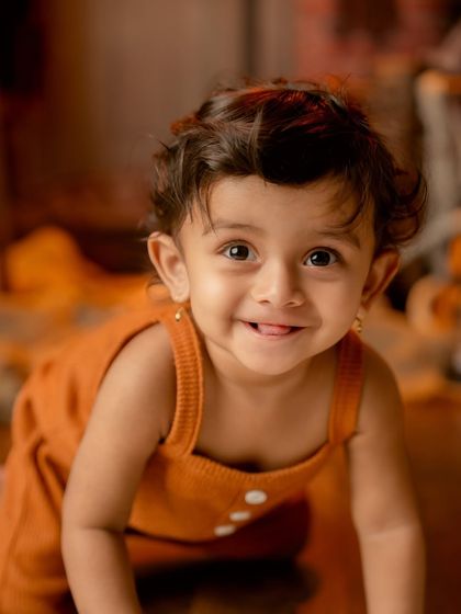 A beautiful, bright smile captured during a rustic-themed shoot. Sometimes the simplest moments are the most precious.