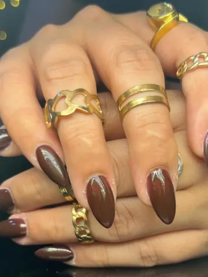 Another angle of the sophisticated dark brown nails.