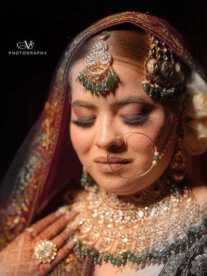 A creative bridal portrait with a double exposure effect, blending two beautiful images of the bride into one artistic shot.