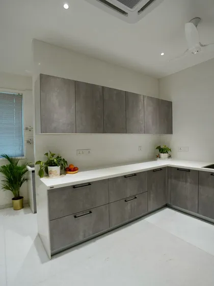 Another angle of the wet kitchen, showing the simple, clean lines and durable finishes that make it a practical workhorse.