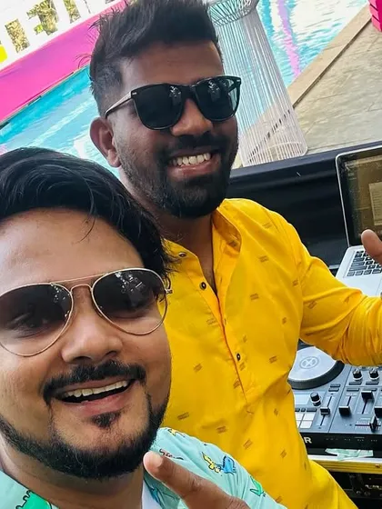 A quick selfie with the talented DJ Mash during a Goa carnival party. Teamwork with other vendors is key to a successful event.
