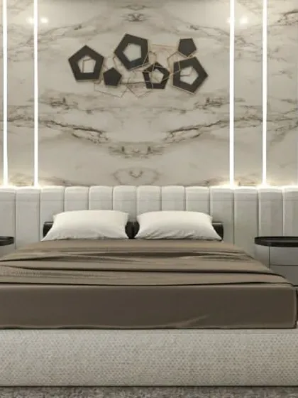 The bed and feature wall from the luxurious bedroom concept, highlighting the interplay of light and texture.