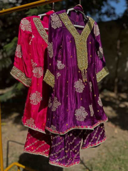 Two shades of magic. My Gota Patti sharara set in fuchsia and purple, hanging side-by-side. The rich velvet and gold work are perfect for festive glam.